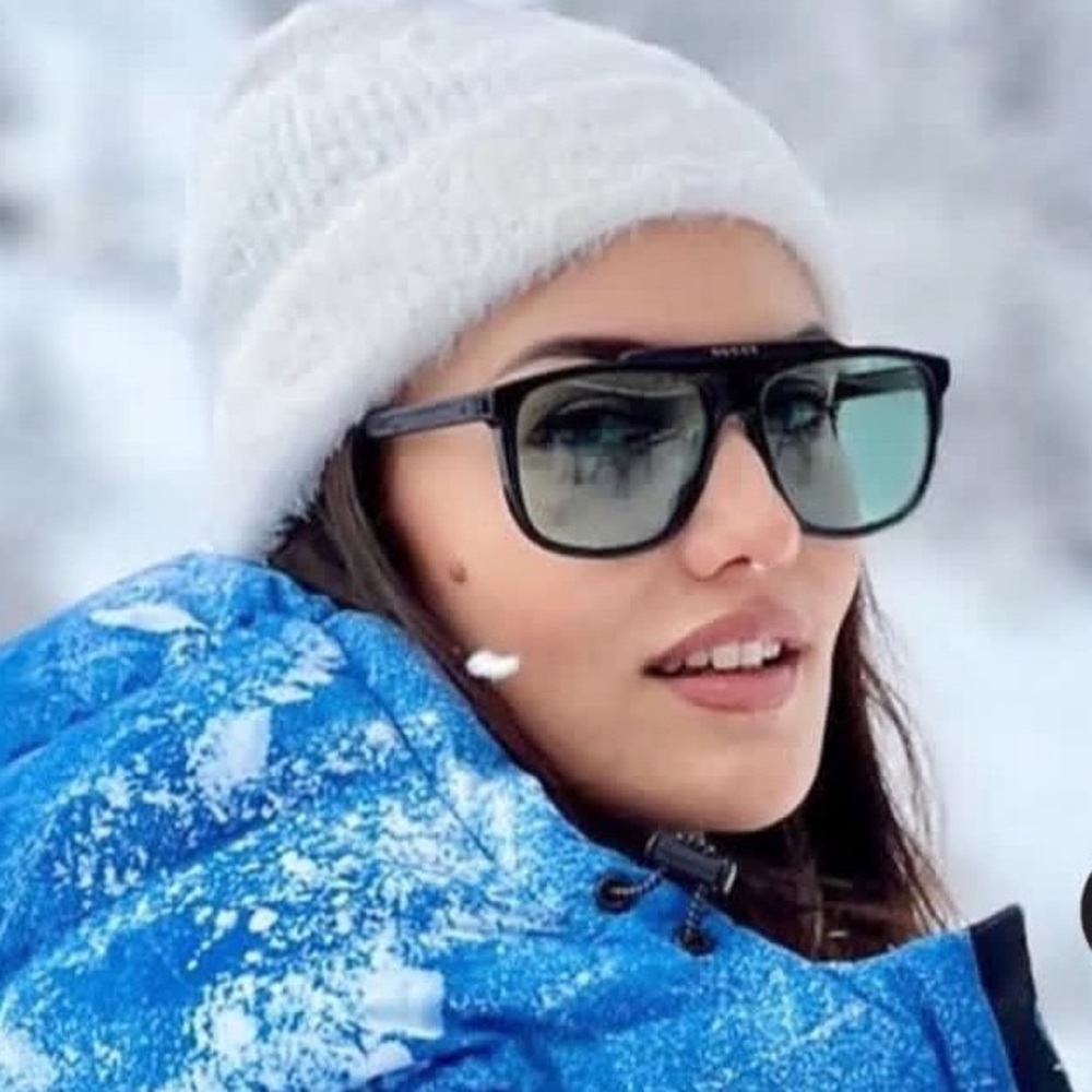 Gucci Black Frame Sunglasses with Green Tint Lenses